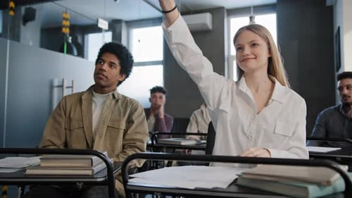 Diverse Students Classmates Attentively Listening to Interesting Lecture Enthusiasm in Classroom