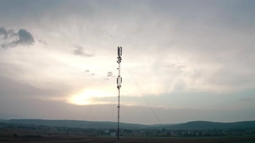 Aerial Drone View. Communication Transmitter Tower in the Countryside