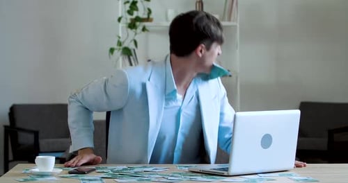 Funny Comic Business Men Office Worker Sitting at Table in Front of Mountain of Money, Grabbing Hold
