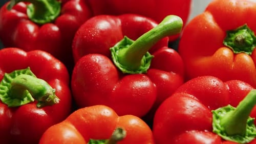 Fresh Red Bell Peppers with Water Droplets