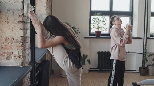 Girl Stretching in Studio
