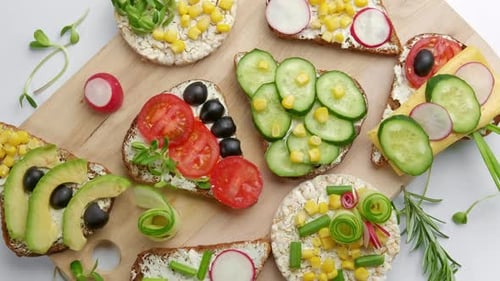 Delicious Vegetable Bread Platter Displayed on Wooden Surface