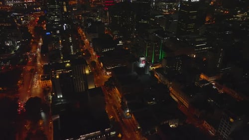 High Angle View of Orange Illuminated Streets in Night City