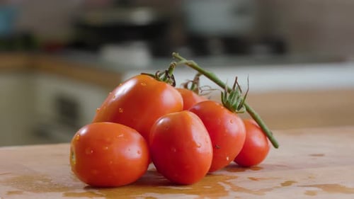 Tomato On the Table In Kitchen In House