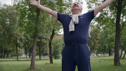 Elderly Man Training in Park