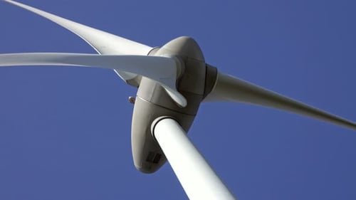 Windmill or Wind Turbine Closeup in Rotation