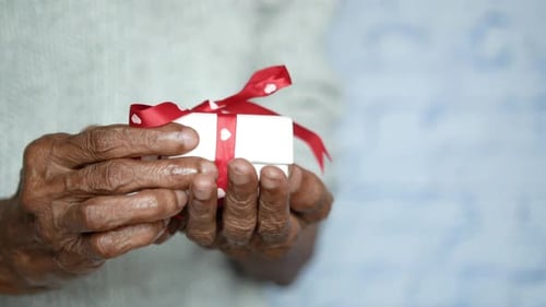 High Angle View of Gift Box on Hand