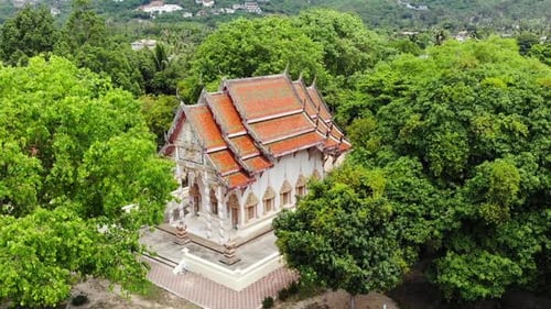 Classic Buddhist Temple Between Forest. From Above Drone View Buddhist Monastery Between Green Trees