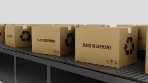 Boxes with MADE IN Germany Text on Conveyor