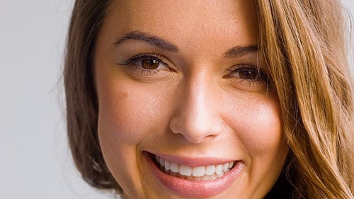 Close Up of Smiling Woman with Brown Hair