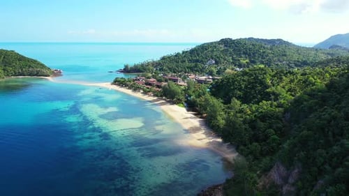 Aerial view landscape of marine resort beach holiday by clear lagoon with white sandy background of