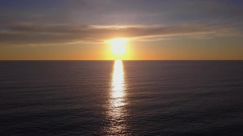 Aerial View Drone Flying Over Sea Surface in Evening Sun Light, Golden Hour Sunset, Cinematic Shot