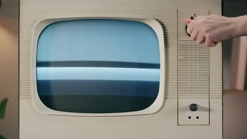 Turning Knobs on an Old TV