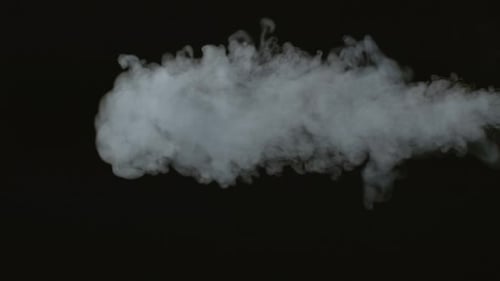 Drifting White Smoke on Black Background