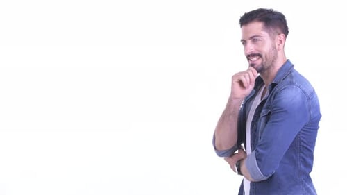 Profile View of Happy Young Bearded Hipster Man Thinking