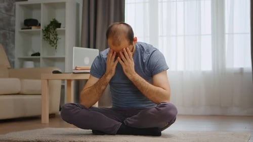 Depressed Man on the Carpet