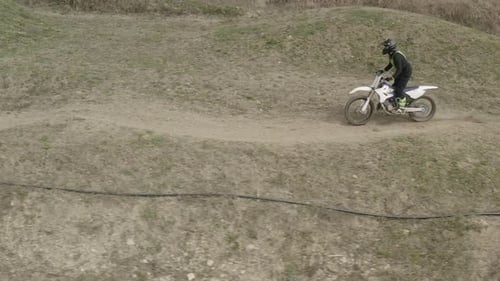 Dirt Bike Rider on a Rural Motocross Track