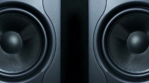 Extreme Close Up of Two Black Speakers