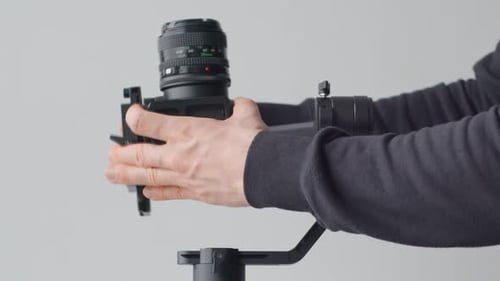 Camera Being Adjusted on Gimbal Mount