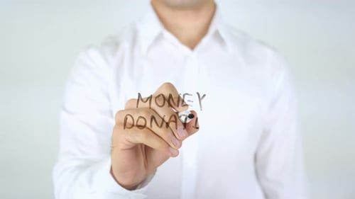 Writing Money Donation on a Transparent Surface