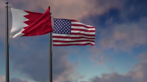 Bahrain and USA Flags Waving Together against Blue Sky