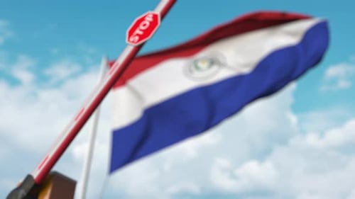 Automatic Barrier with Stop Sign and Waving National Flag