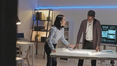 Team Planning Future Technology in Modern Workplace