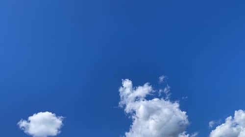 Blue Sky with Clouds and Vapor Trail