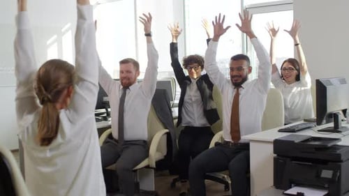 Businesspeople Exercising in Office