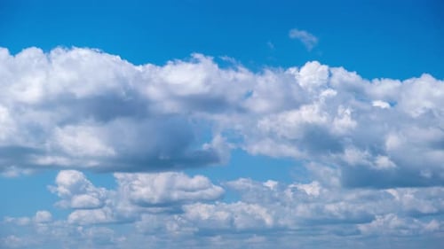 Timelapse of Cumulus Clouds Moving in the Blue Sky