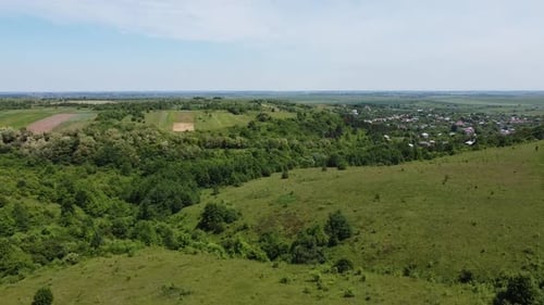 Aerial drone view of a flying over the rural agricultural landscape.