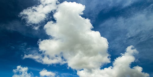 Blue Sky with Fluffy White Clouds