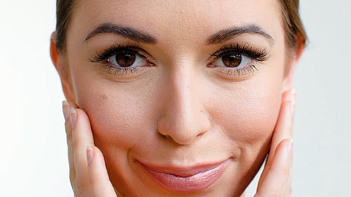 Close Up of Woman's Beautiful Face and Smile