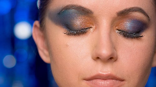 Woman's Face Showing Detailed Eye Makeup Art