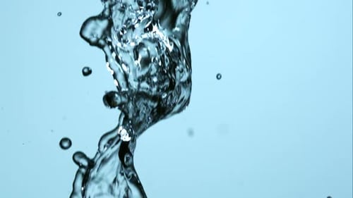 Splashing Water Against a Blue Background