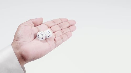 Hand Holds Numbered Dice Six And Two Sixty Two 62