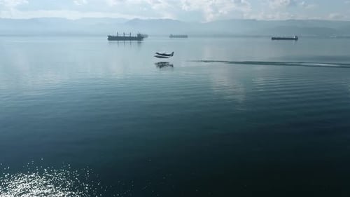 Drone Image of a Seaplane Taking Off From The Sea