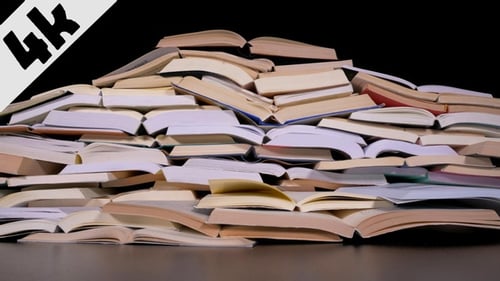 Books Pile Up in an Abstract Scene