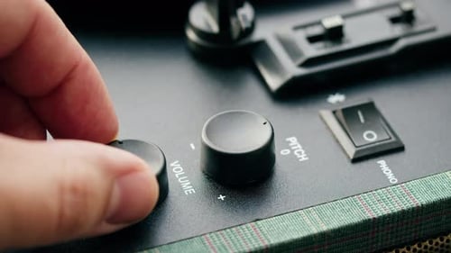 Turning on Music Volume Closeup