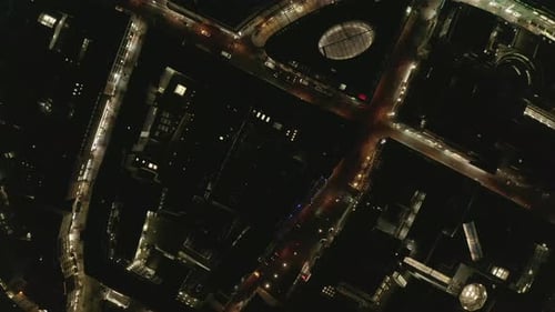 Aerial Birds Eye View of City at Night