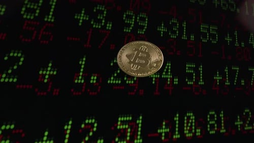 Close up shot golden bitcoin on green infograhic