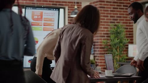 Business People Arriving Together in Meeting Office