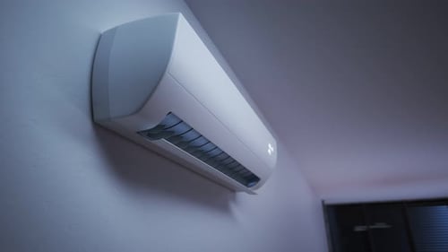 Modern Air Conditioner Unit Adjusting Temperature