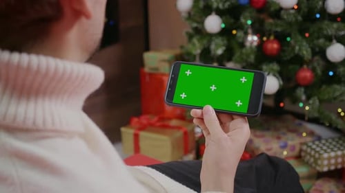 Green Screen phone Chroma Key horizontal mode using on Christmas season New year