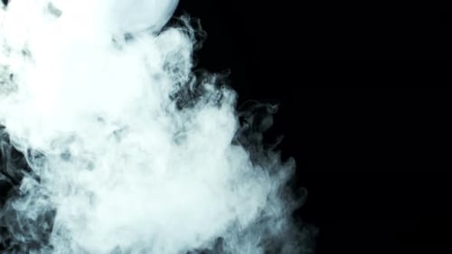 Billowing White Smoke on Black Background