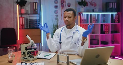 Young Adult Meditating in Lab Setting