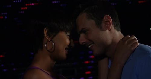 Couple dancing together in pub