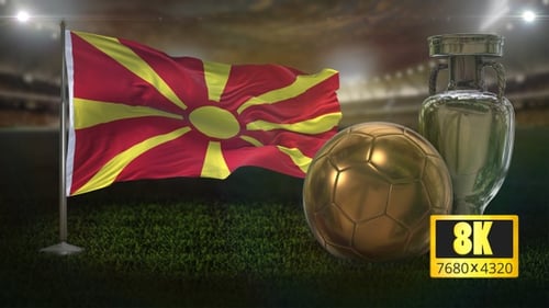 Macedonian Flag Waving with Gold Soccer Ball and Silver Trophy on Field