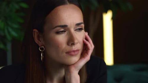 Businesswoman Thinking on Sofa in Office. Manager Posing at Remote Workplace