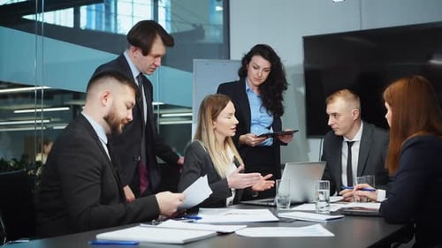 Business Team Collaborating at Meeting Table